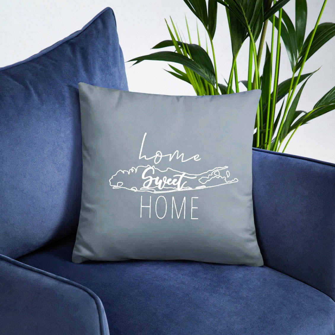 Home Sweet Home Long Island pillow on blue velvet couch chair for classy home decor